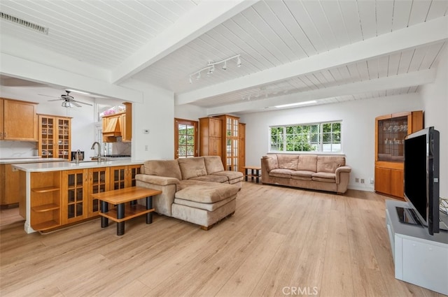 4950 Dunman Ave, Woodland Hills, CA 91364 - living room featuring light wood-type flooring, ceiling fan, wooden ceiling with exposed beams, and baseboards