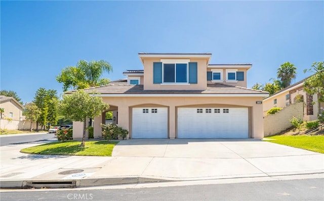2902 Easton Pl, Rowland Heights, CA 91748 - view of front of home with an attached garage, concrete driveway, stucco siding, and a tiled roof