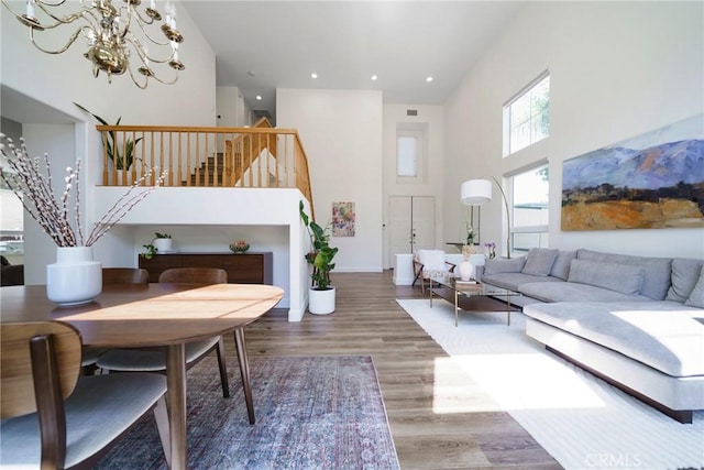 2902 Easton Pl, Rowland Heights, CA 91748 - living room with a high ceiling, stairway, wood finished floors, a chandelier, and recessed lighting