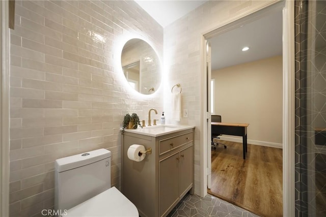 2902 Easton Pl, Rowland Heights, CA 91748 - full bathroom with vanity, toilet, tile walls, and recessed lighting