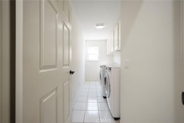 2902 Easton Pl, Rowland Heights, CA 91748 - laundry room with cabinet space, washer and clothes dryer, and light tile patterned floors