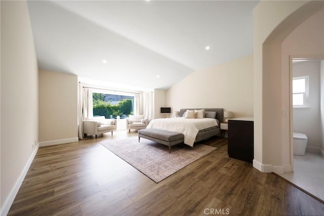 2902 Easton Pl, Rowland Heights, CA 91748 - bedroom with arched walkways, multiple windows, wood finished floors, vaulted ceiling, and baseboards