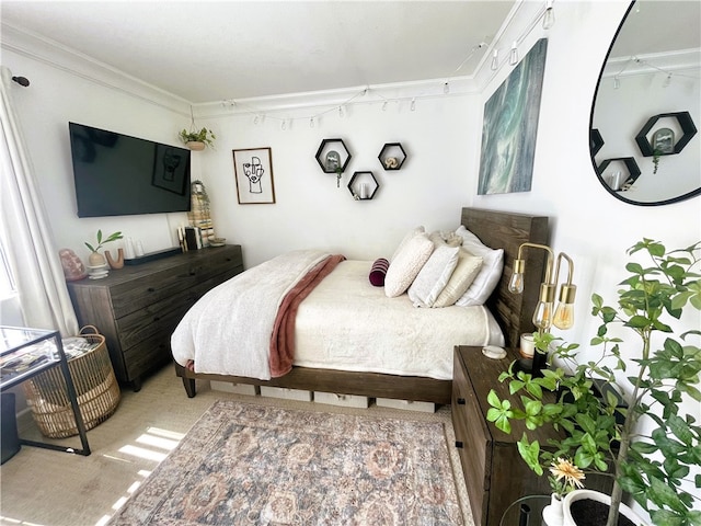 10960 Ashton Ave Unit 307, Los Angeles, CA 90024 - bedroom featuring rail lighting and crown molding