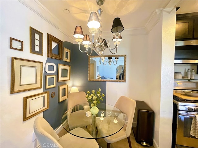 10960 Ashton Ave Unit 307, Los Angeles, CA 90024 - dining room featuring crown molding and a chandelier