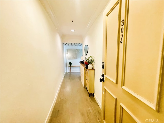 10960 Ashton Ave Unit 307, Los Angeles, CA 90024 - hall featuring ornamental molding and light wood-style floors