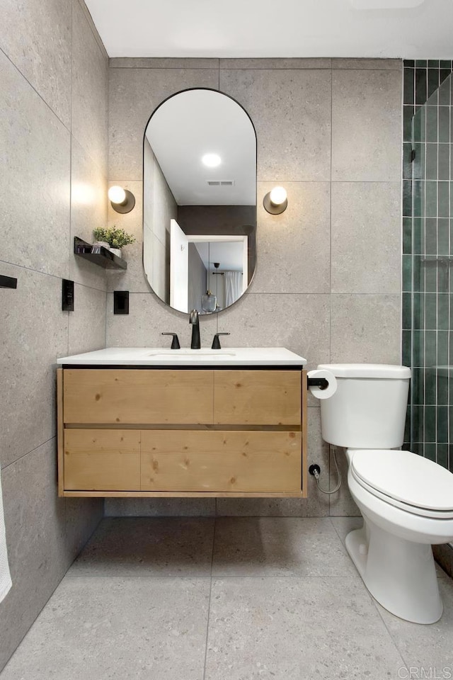 4736 Dalea Pl, Oceanside, CA 92057 - bathroom with tile walls, vanity, and toilet