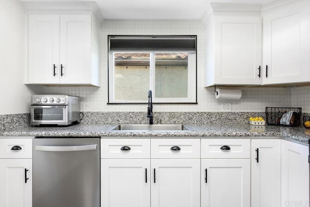 4736 Dalea Pl, Oceanside, CA 92057 - kitchen with stainless steel dishwasher, a sink, white cabinets, and light stone countertops