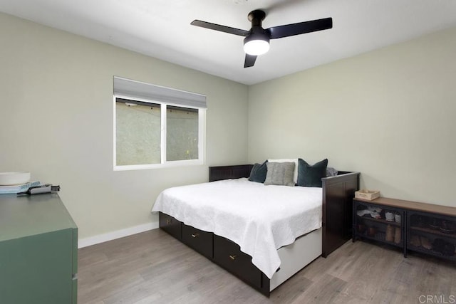4736 Dalea Pl, Oceanside, CA 92057 - bedroom featuring light wood-style floors, baseboards, and a ceiling fan