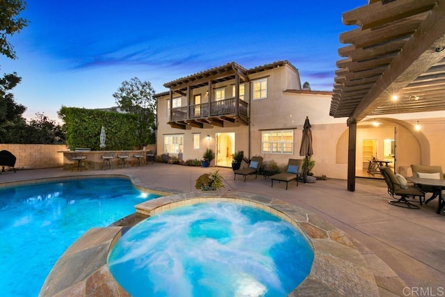 7845 Caminito Camelia, San Diego, CA 92127 - view of pool featuring a patio area, a pool with connected hot tub, and outdoor dining space
