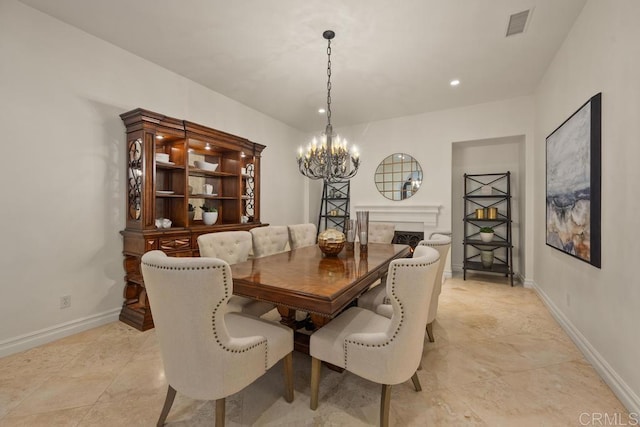 7845 Caminito Camelia, San Diego, CA 92127 - dining area with a chandelier, baseboards, a fireplace, and recessed lighting