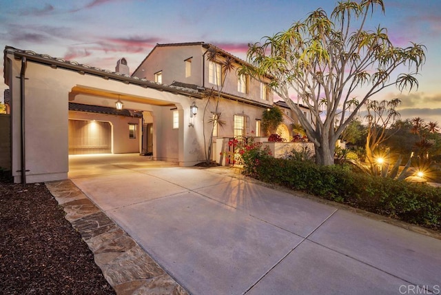 7845 Caminito Camelia, San Diego, CA 92127 - mediterranean / spanish-style house featuring driveway and stucco siding