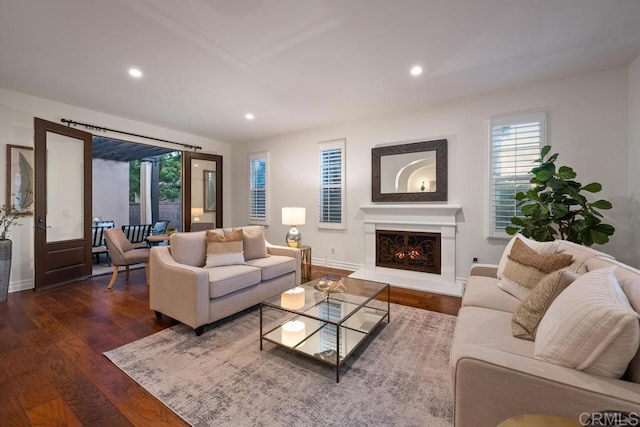 7845 Caminito Camelia, San Diego, CA 92127 - living area with healthy amount of natural light, recessed lighting, wood finished floors, and a warm lit fireplace