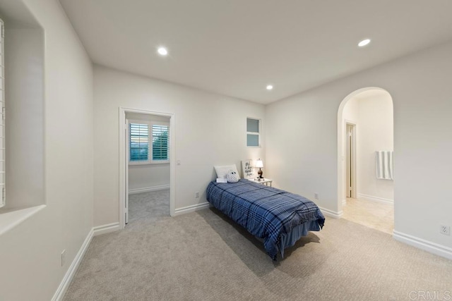 7845 Caminito Camelia, San Diego, CA 92127 - carpeted bedroom with arched walkways and recessed lighting