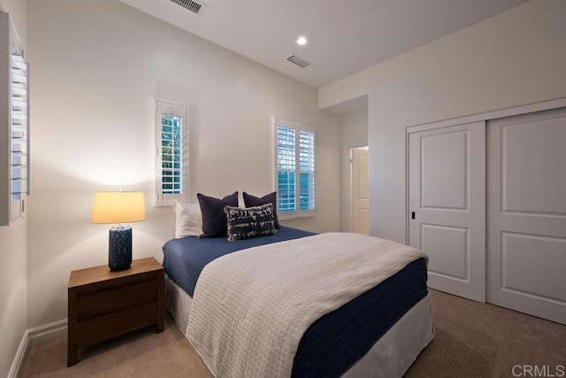 7845 Caminito Camelia, San Diego, CA 92127 - bedroom featuring light carpet, a closet, and recessed lighting