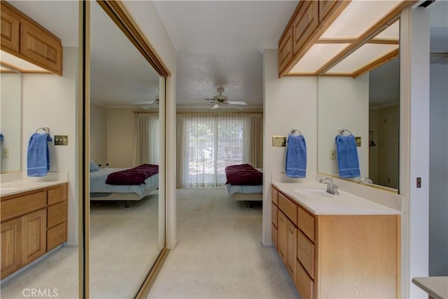 1375 San Gabriel Way, Merced, CA 95340 - full bathroom featuring ensuite bath, two vanities, ornamental molding, and ceiling fan