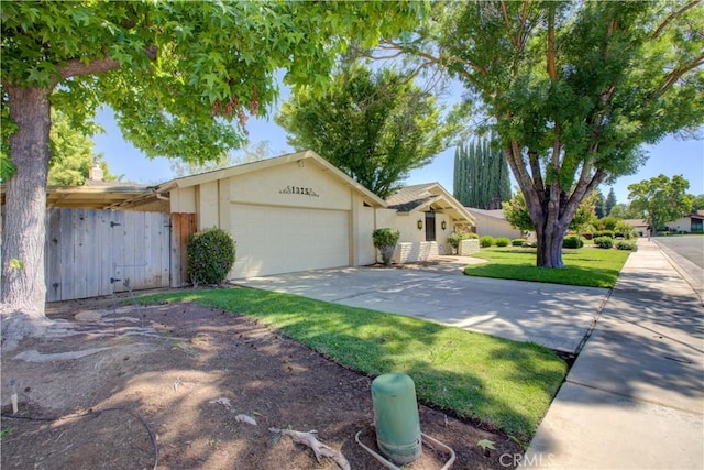 1375 San Gabriel Way, Merced, CA 95340 - single story home featuring a garage, concrete driveway, stucco siding, and a front lawn