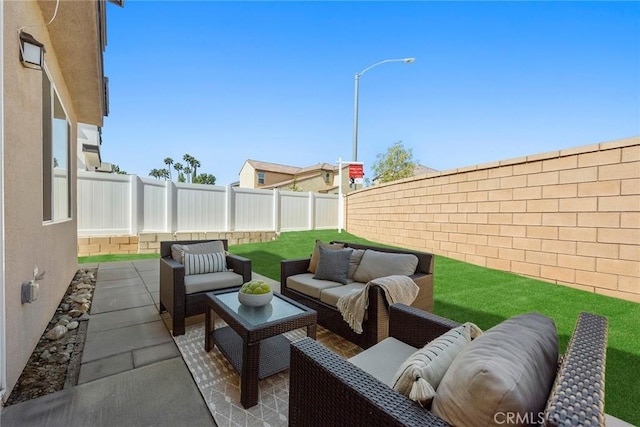 2544 Gunner Ridge Way, Rialto, CA 92377 - fenced backyard featuring outdoor lounge area and a patio