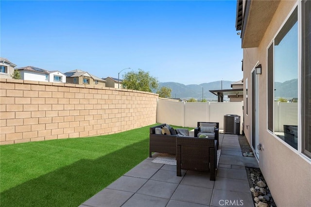 2544 Gunner Ridge Way, Rialto, CA 92377 - view of yard featuring outdoor lounge area, central AC, a patio area, and a mountain view