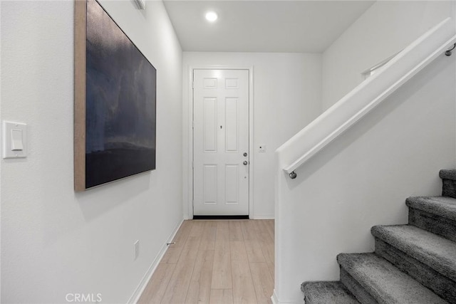 2544 Gunner Ridge Way, Rialto, CA 92377 - entrance foyer featuring stairs, baseboards, light wood-style flooring, and recessed lighting