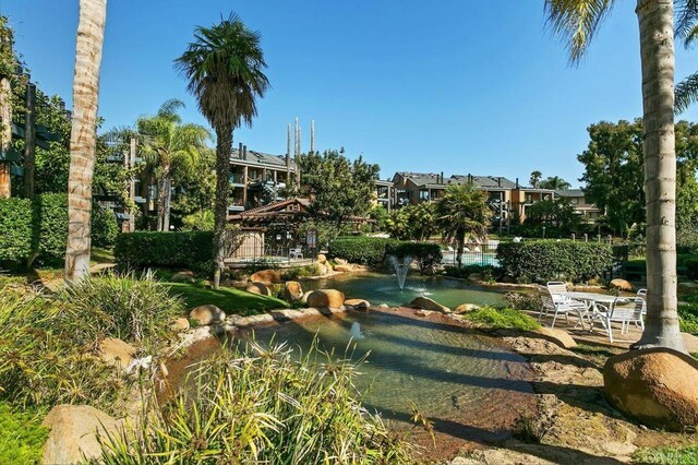 801 Kalpati Cir Unit B, Carlsbad, CA 92008 - view of home's community featuring a garden pond