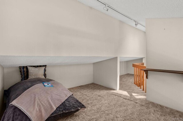 801 Kalpati Cir Unit B, Carlsbad, CA 92008 - carpeted bedroom featuring rail lighting
