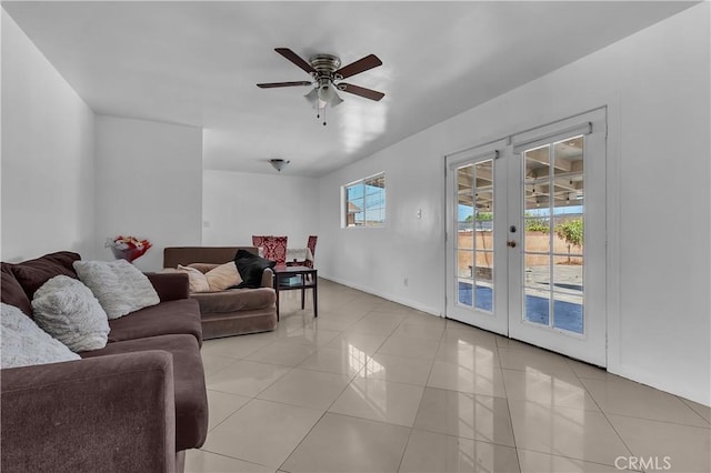 1144 Magnolia Ave, Gardena, CA 90247 - living area with light tile patterned flooring, french doors, a ceiling fan, and baseboards