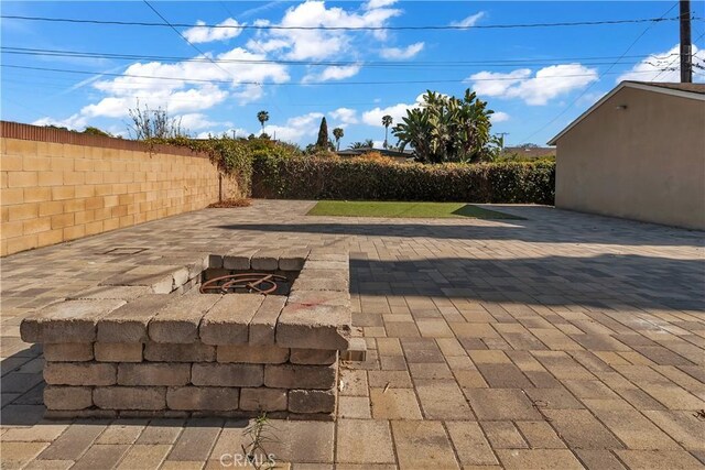 1144 Magnolia Ave, Gardena, CA 90247 - fenced backyard featuring a patio area