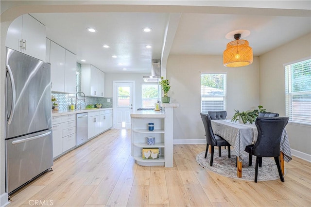 417 E 44th Way, Long Beach, CA 90807 - kitchen featuring appliances with stainless steel finishes, light countertops, open shelves, plenty of natural light, and recessed lighting