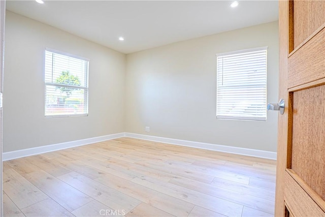 417 E 44th Way, Long Beach, CA 90807 - unfurnished room with light wood-style floors, recessed lighting, and baseboards