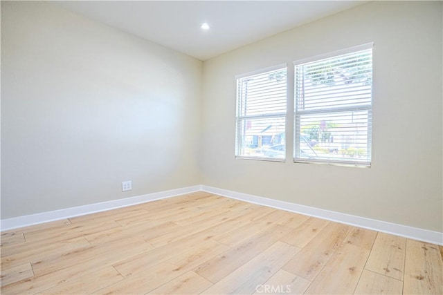 417 E 44th Way, Long Beach, CA 90807 - spare room with light wood-style floors, healthy amount of natural light, baseboards, and recessed lighting