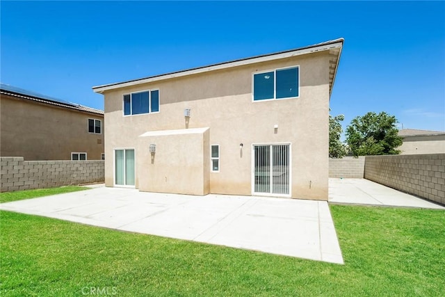 45529 36th St E, Lancaster, CA 93535 - rear view of house featuring stucco siding and a patio area
