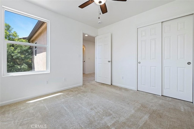 1587 N Strada Way, Clovis, CA 93619 - unfurnished bedroom featuring carpet, a closet, and a ceiling fan