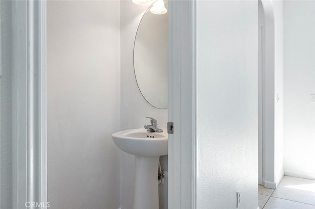 1587 N Strada Way, Clovis, CA 93619 - bathroom with tile patterned flooring and a sink