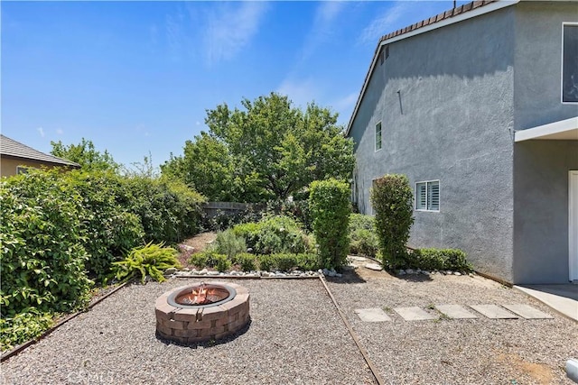 1825 Duncan Way, Corona, CA 92881 - view of yard with an outdoor fire pit and a patio