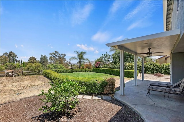1825 Duncan Way, Corona, CA 92881 - view of yard featuring a ceiling fan and a patio