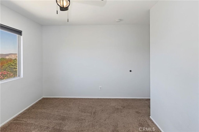 1825 Duncan Way, Corona, CA 92881 - empty room featuring carpet floors, ceiling fan, baseboards, and a smoke detector