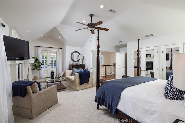 411 Snug Harbor Rd, Newport Beach, CA 92663 - carpeted bedroom featuring lofted ceiling, recessed lighting, access to outside, a fireplace, and french doors