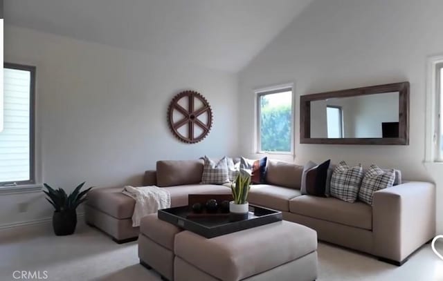 411 Snug Harbor Rd, Newport Beach, CA 92663 - living room featuring light colored carpet, lofted ceiling, and baseboards