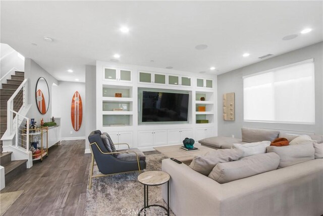 1639 Bridgewater Way, Costa Mesa, CA 92627 - living area with stairway, dark wood-style flooring, recessed lighting, baseboards, and built in features