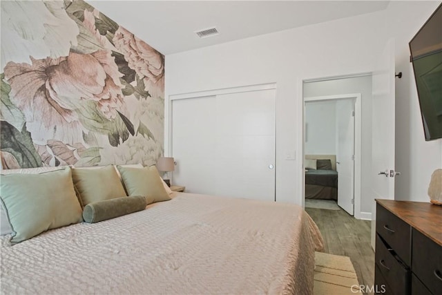 1639 Bridgewater Way, Costa Mesa, CA 92627 - bedroom featuring wood finished floors and a closet