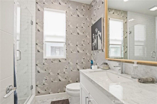 1639 Bridgewater Way, Costa Mesa, CA 92627 - full bath with healthy amount of natural light, vanity, a stall shower, and toilet