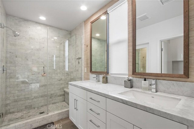 1639 Bridgewater Way, Costa Mesa, CA 92627 - full bathroom with double vanity, a shower stall, and recessed lighting