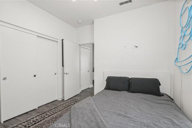 1639 Bridgewater Way, Costa Mesa, CA 92627 - bedroom with wood finished floors and a closet