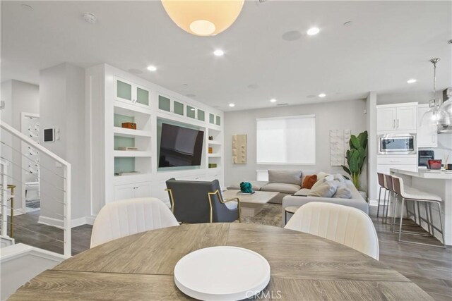 1639 Bridgewater Way, Costa Mesa, CA 92627 - dining space with recessed lighting, wood finished floors, and stairway