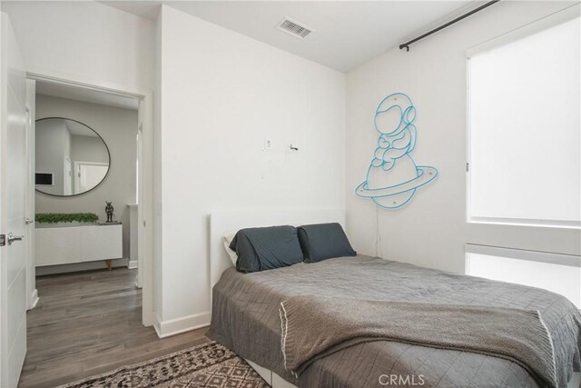 1639 Bridgewater Way, Costa Mesa, CA 92627 - bedroom with wood finished floors and baseboards