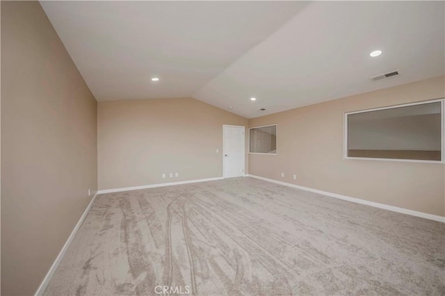 5338 S Chariton Ave, Ladera Heights, CA 90056 - spare room with carpet flooring, baseboards, lofted ceiling, and recessed lighting