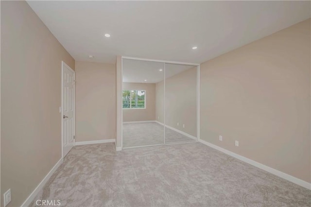 5338 S Chariton Ave, Ladera Heights, CA 90056 - unfurnished bedroom featuring carpet, recessed lighting, baseboards, and a closet