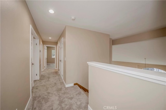 5338 S Chariton Ave, Ladera Heights, CA 90056 - hallway featuring baseboards, light carpet, recessed lighting, and an upstairs landing