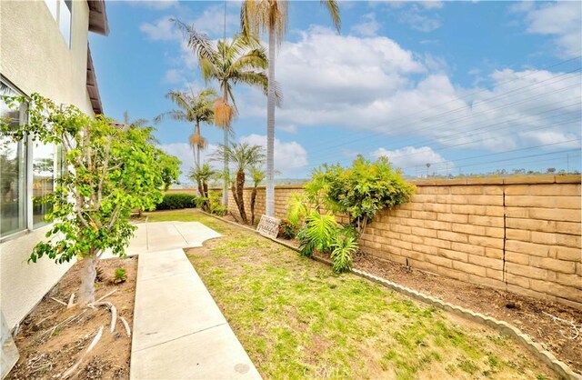 5338 S Chariton Ave, Ladera Heights, CA 90056 - fenced backyard featuring a patio area