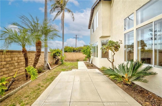 5338 S Chariton Ave, Ladera Heights, CA 90056 - fenced backyard with a patio